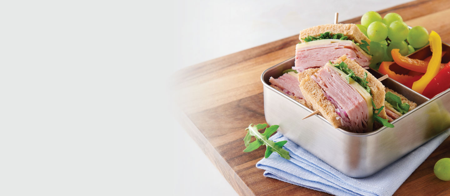 ham sandwiches in a lunch box